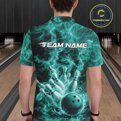 Back view of a mens bowling polo showcasing a turquoise blue bowling ball striking pins against a fiery background.