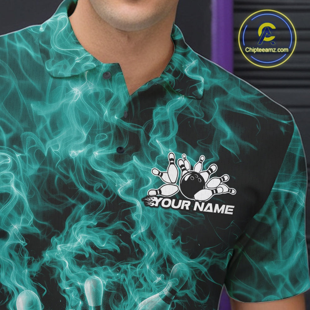 Left chest close-up of a bowling polo featuring a turquoise blue bowling ball crashing through pins with flame graphics.