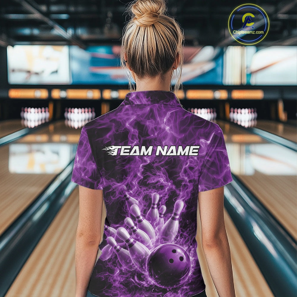 Back view of a womens bowling polo showcasing a purple bowling strike scene with flames.