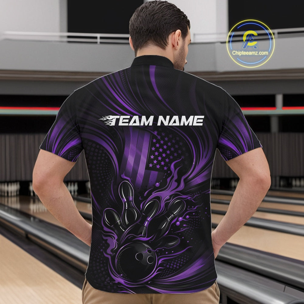 Front view of a male model at a bowling lane wearing a black and purple quarter-zip shirt with a fiery bowling strike motif and distressed American flag details.