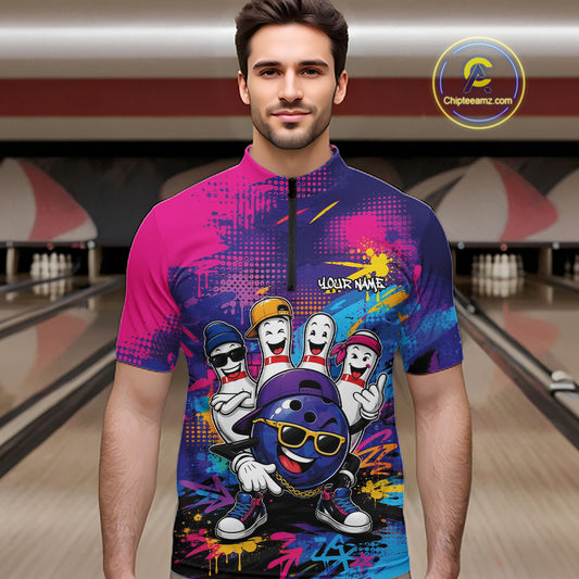 A man wearing a short-sleeve bowling jersey with a colorful bowling-themed graphic prin. The jersey features a pink and purple grraffity background with cartoon bowling balls and pins, and a black zipper at the collar.