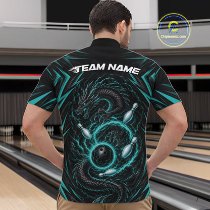 A man viewed from behind wearing a black short-sleeve bowling-themed shirt with a large teal and black dragon wrapping around bowling pins and a ball on the back, plus 'TEAM NAME' printed across the shoulders. The setting appears to be a bowling alley