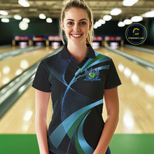 Load image into Gallery viewer, Woman wearing a black and blue bowling shirt with a logo in a bowling alley.