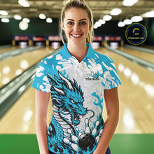 Load image into Gallery viewer, Woman wearing a blue and white bowling shirt with a dragon design in a bowling alley.