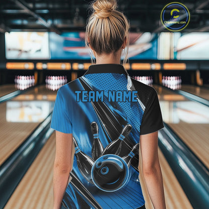 Back view of a female model in a black and blue bowling polo shirt featuring a bowling ball striking pins with dynamic speed streak graphics.