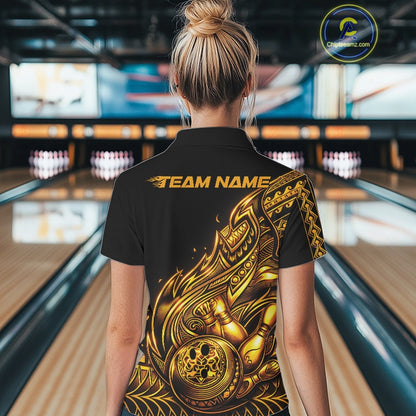 Back view of a female model in a black and gold bowling polo shirt showcasing tribal bowling artwork with flowing flame accents.