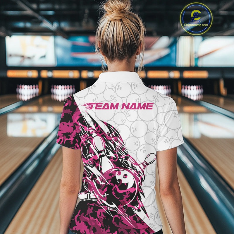 Back view of a female model in a white bowling polo shirt featuring pink camo streak accents and bowling motifs.