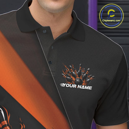 Close-up view of the left chest area of a black and orange bowling polo shirt showing a flame bowling ball and pins design detail.