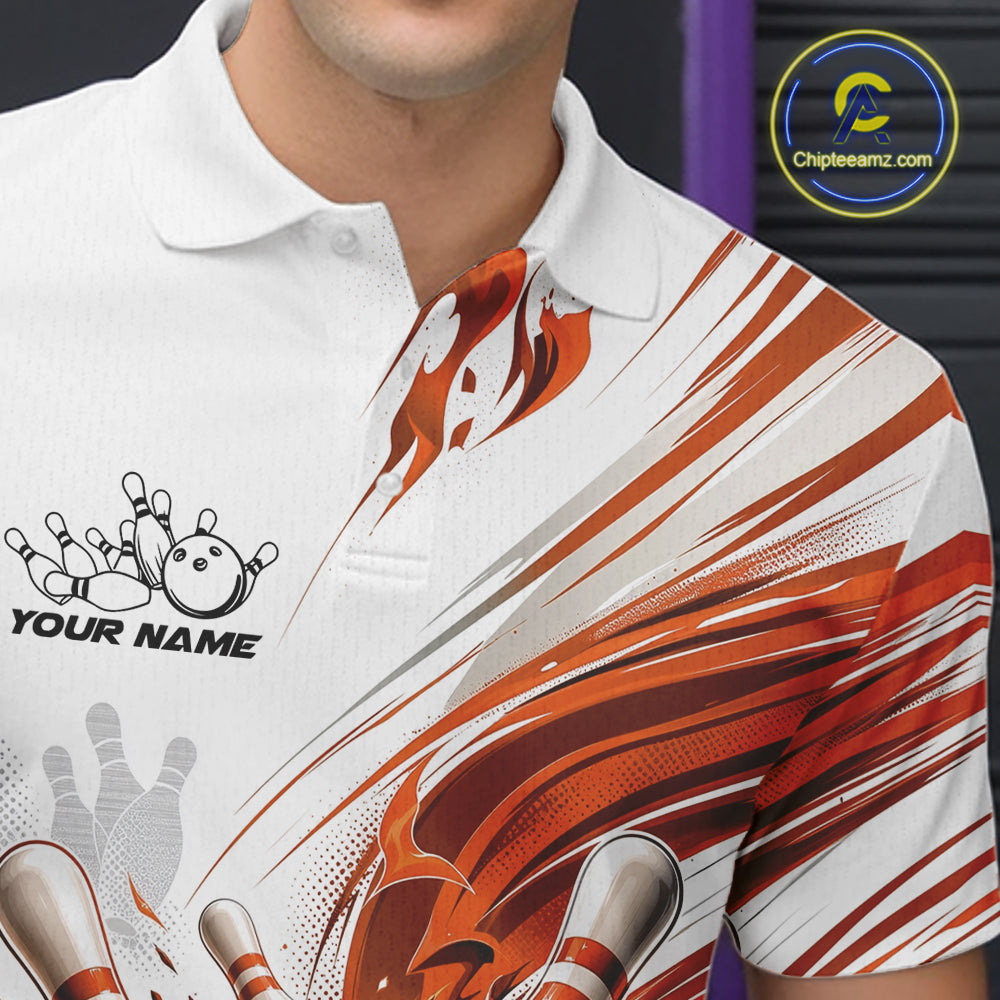 A close-up of a white short-sleeve polo shirt with bowling-themed graphics, including bowling pins, balls, and orange and gray abstract streaks. The shirt has a customizable name printed on the left chest