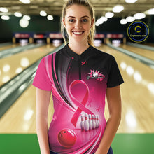 Load image into Gallery viewer, Female model wearing a black and pink bowling quarter zip with breast cancer awareness ribbons and bowling graphics, front view