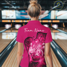 Load image into Gallery viewer, Back view of a female model wearing a pink bowling quarter zip with butterfly artwork and bowling graphics at the bowling lane