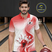 Load image into Gallery viewer, Front view of a male model in a white and red bowling polo featuring flowing wave artwork and a glossy bowling ball knocking down pins inside a bowling alley