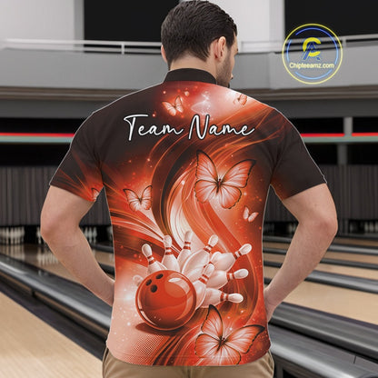 Front view of a mens orange bowling quarter-zip showcasing a bowling ball knocking down pins surrounded by butterfly graphics.