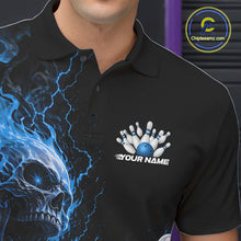 Load image into Gallery viewer, Close up of the left chest on a black bowling polo featuring a blue flaming skull graphic with a custom name.

