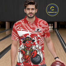Load image into Gallery viewer, Front view of a male model in a bowling alley wearing a red custom bowling polo shirt with a funny Cajun crawfish leaning on a bowling ball and a swamp inspired texture background.