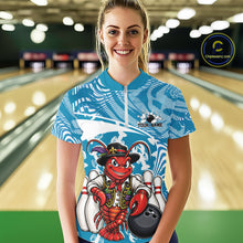 Load image into Gallery viewer, Front view of a happy female model in a bowling alley wearing a blue custom quarter-zip bowling shirt with a funny Cajun crawfish leaning on a bowling ball and a swamp-inspired texture background.
