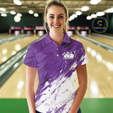 Load image into Gallery viewer, Woman wearing a purple and white bowling shirt with a logo in a bowling alley.