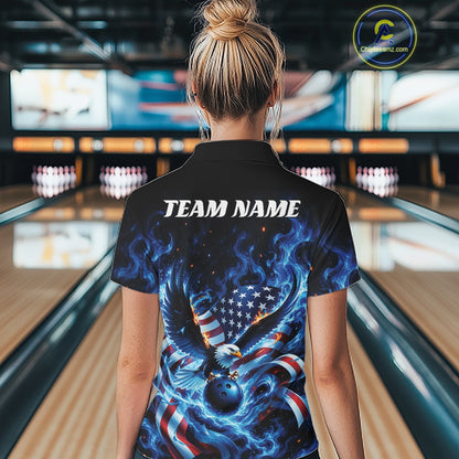 Female model back view in a bowling lane wearing a bowling quarter zip shirt with flaming eagle artwork, blue bowling ball, flag accents, and blue flames.