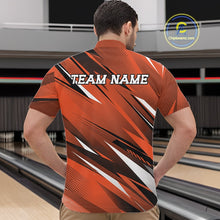 Load image into Gallery viewer, Person wearing an orange and black bowling shirt with 'TEAM NAME' text in a bowling alley.