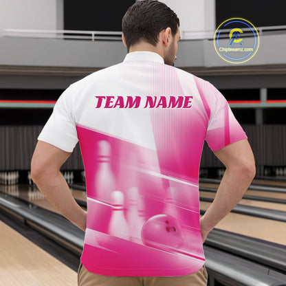 Front view of a male model in a bowling lane wearing a white and pink quarter zip shirt with bowling ball and pins geometric artwork.
