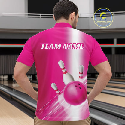 Front view of a male model at the bowling lane wearing a quarter zip shirt with bowling ball and pins flowing through a pink gradient layout.