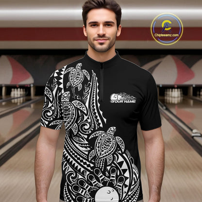 Male model wearing a black and white bowling quarter-zip shirt at the bowling lane with Polynesian-style bowling graphics.