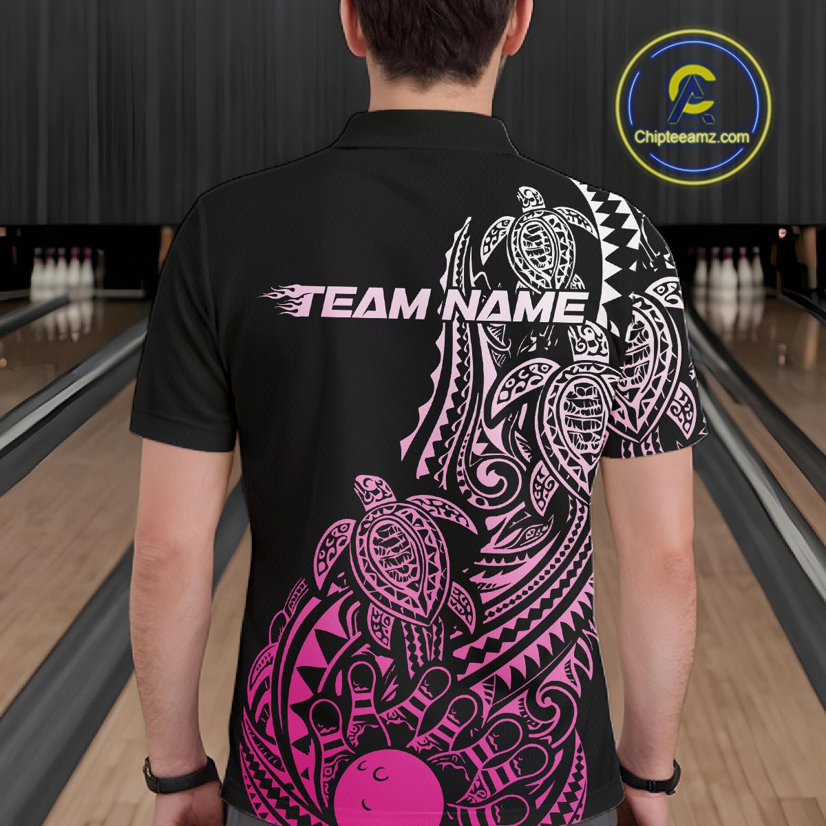 Back view of a male model in a black and pink bowling polo shirt displaying turtle Polynesian bowling graphics.