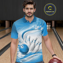 Load image into Gallery viewer, Male model standing in a bowling lane wearing a white and blue bowling polo shirt featuring abstract wave lines and a glossy bowling ball striking pins on the front.