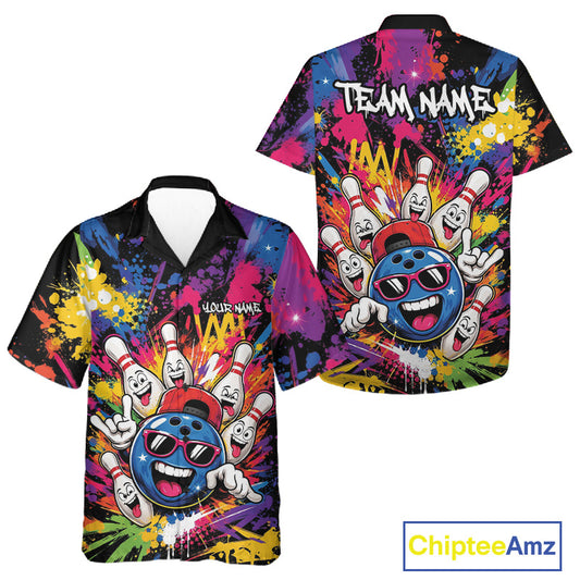 A short-sleeve bowling-themed button up shirt shown from both front and back on a white background. The shirt features a black base covered in vivid multicolor paint splatters and a large bowling graphic with a cartoon bowling ball, bowling pins character