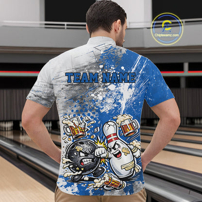 Front view of a male model in a bowling lane wearing a blue and white grunge splatter bowling quarter-zip shirt featuring playful bowling ball and pin fist-fighting illustration.