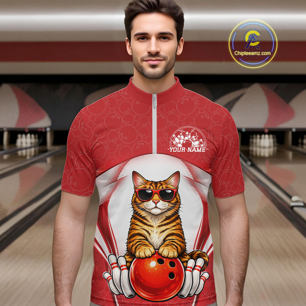 Male model at a bowling lane wearing a bowling quarter-zip shirt with a Bengal cat in sunglasses and bowling ball graphics.