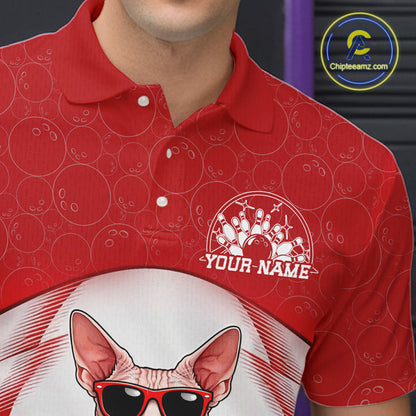 Close-up of the left chest area on a white and red bowling polo shirt featuring a sphynx cat in sunglasses beside a bowling ball.