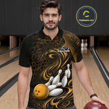 Load image into Gallery viewer, Male model wearing a black and yellow bowling polo shirt in a bowling alley featuring a tribal flame bowling ball and pins graphic