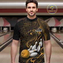 Load image into Gallery viewer, Male model wearing a black and yellow bowling quarter-zip shirt in a bowling alley featuring a tribal flame bowling ball and pins graphic