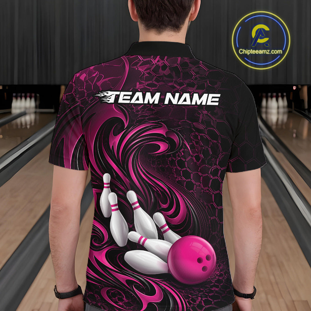 Back view of a male model wearing a black and pink bowling polo shirt in a bowling alley featuring a tribal flame bowling ball and pins graphic