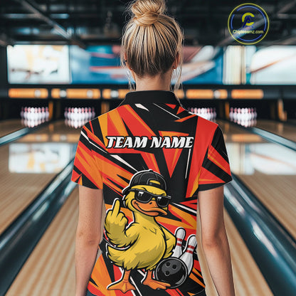 Back view of a black and orange womens bowling polo displaying duck-themed bowling graphics and bold geometric accents.