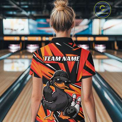 Back view of a womens black and orange bowling polo showcasing a duck, bowling pins, and geometric artwork.