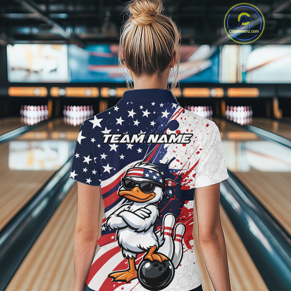 Back view of a womens bowling polo worn in a bowling center featuring a patriotic duck beside a bowling ball graphic.
