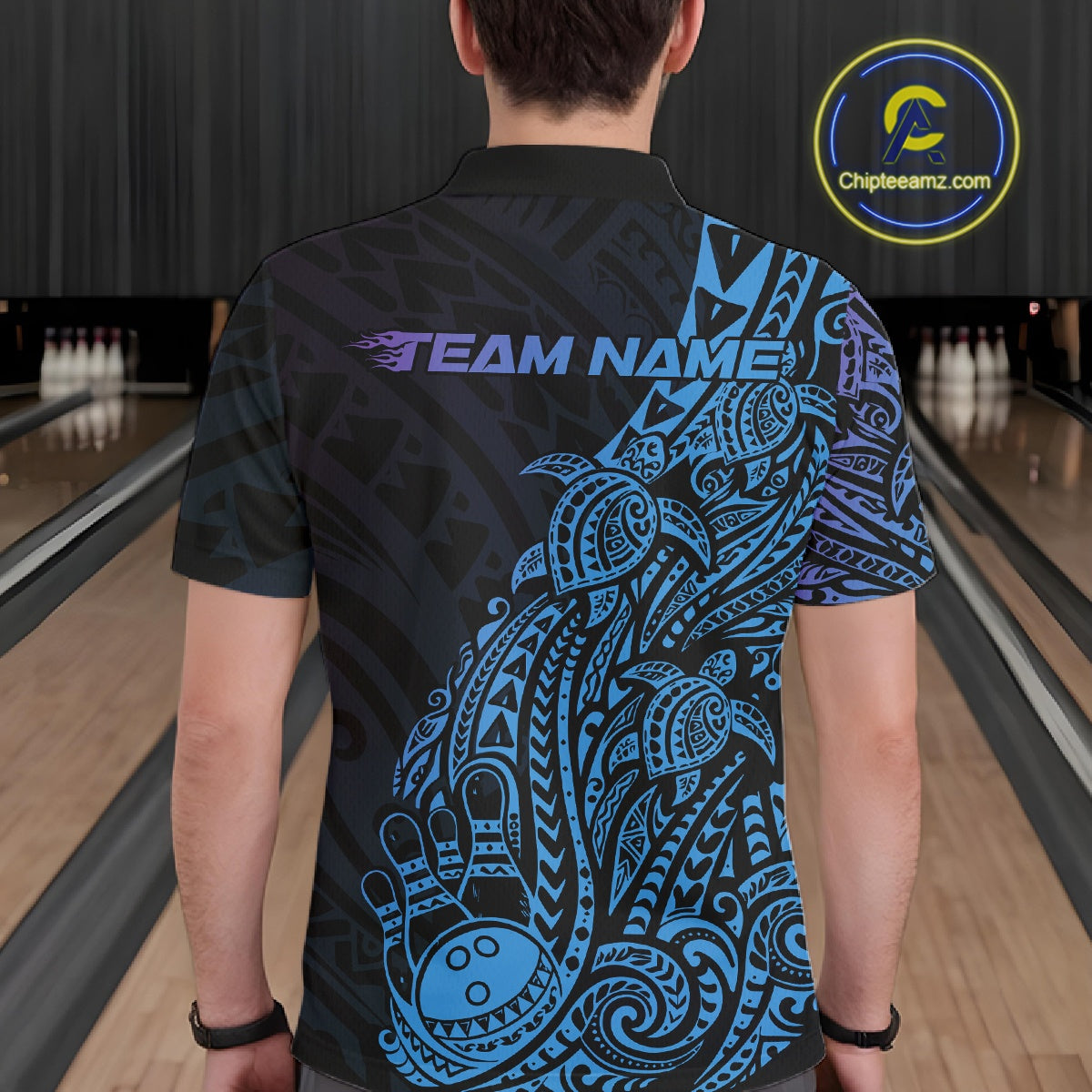 Back view of a male model in a black, blue, and purple bowling polo shirt showcasing turtle-themed bowling artwork and flowing tribal swirls.