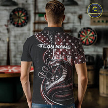 Load image into Gallery viewer, Male model showcasing the back design of a custom red and black stars and stripes patriotic cobra snake men's dart polo shirt with a customizable "TEAM NAME" text template in an indoor setting.