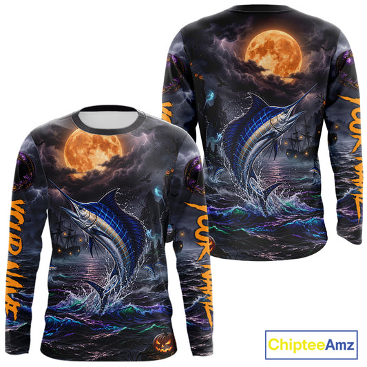 A long-sleeve crewneck shirt shown from both front and back, featuring an all-over Halloween-themed print with a jumping marlin, full moon, dark stormy sky, ships, and orange 'Halloween' text down the sleeves.