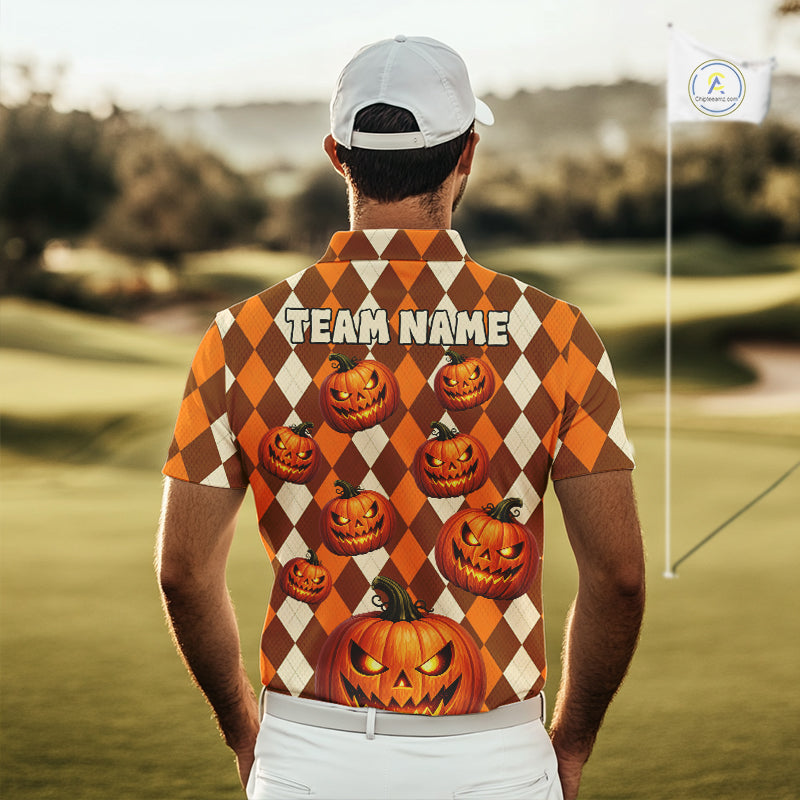 A man viewed from behind wearing a custom short-sleeve golf shirt with an orange and brown harlequin pattern, Halloween jack-o'-lantern graphics, and 'TEAM NAME' printed across the upper back. The background shows a blurred golf course.