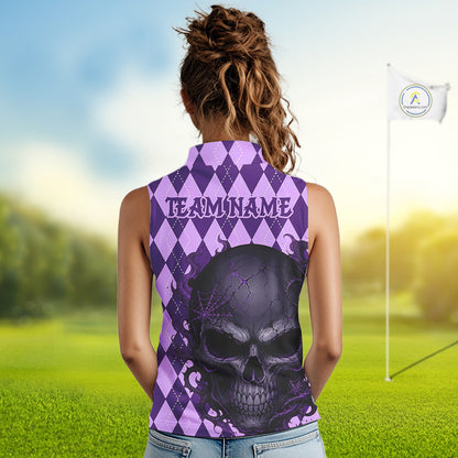 A woman viewed from behind wearing a sleeveless high-neck top with a purple and lavender harlequin pattern, a large black skull graphic, and the text 'TEAMNAME' across the upper back. The background is a blurred green golf course with a flag in the distance.