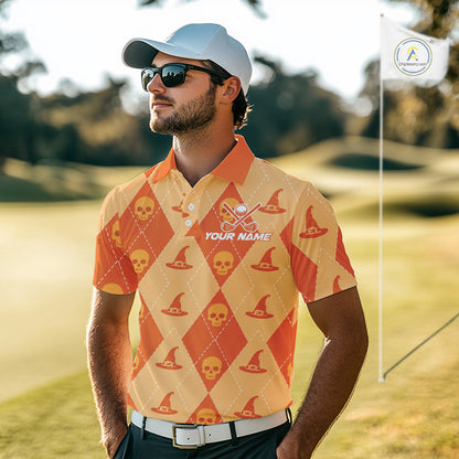 A man wearing a white cap, sunglasses, and a custom orange and yellow argyle golf shirt with skull and witch hat patterns stands on a golf course. The shirt features a 'YOUR NAME' customization placeholder on the chest.
