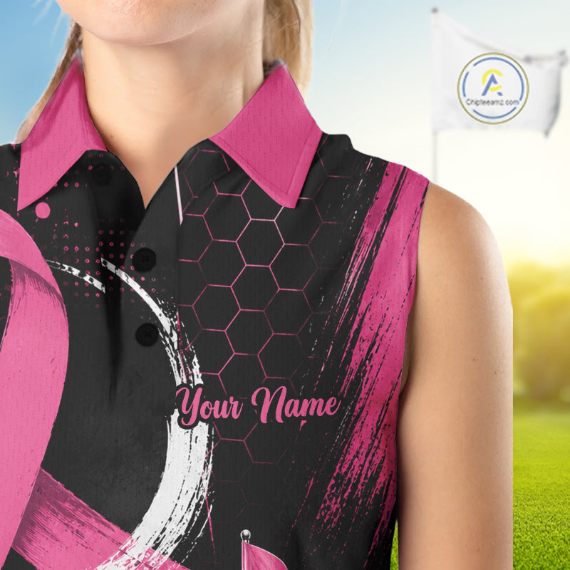 A sleeveless women's polo shirt with a black and pink abstract design, featuring a pink collar, black buttons, a hexagonal pattern on the chest, and 'Your Name' printed in pink script. The shirt is modeled on a person against a blurred golf course background with a flag.
