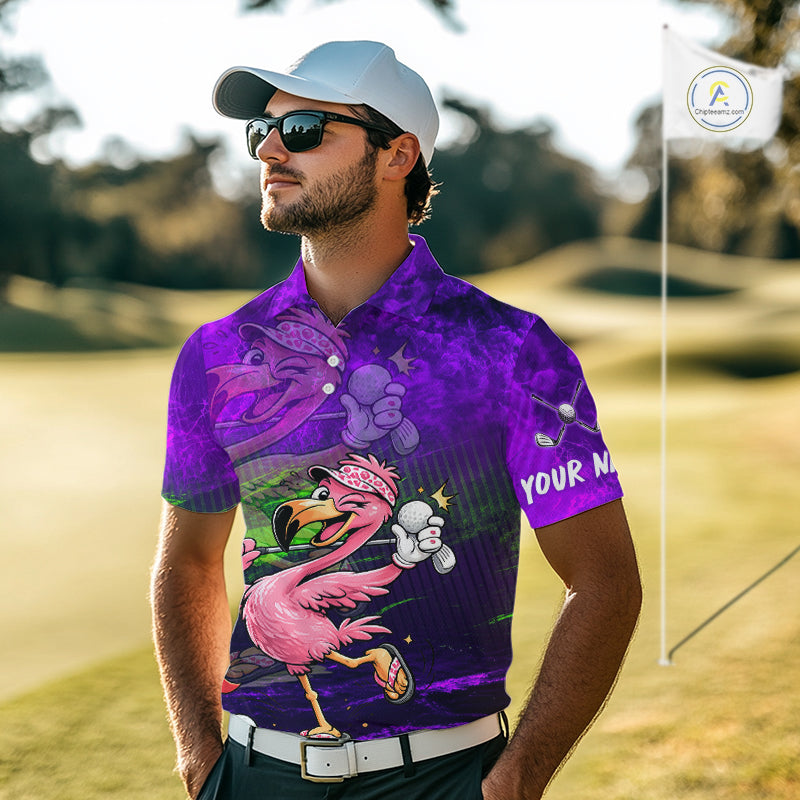 A man wearing a purple and pink flamingo-themed golf shirt, white cap, and sunglasses, standing on a golf course with a flag in the background.