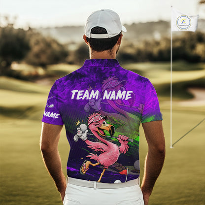 A man viewed from behind wearing a custom-printed purple and black polo shirt with a cartoon flamingo graphic and 'TEAM NAME' printed on the back, standing on a golf course.