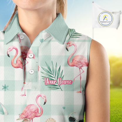 A sleeveless collared polo-style shirt with a pink flamingo and green palm leaf print over a pale mint-and-white gingham background. The shirt has white buttons and a placeholder text area reading 'Your Name' on the chest.