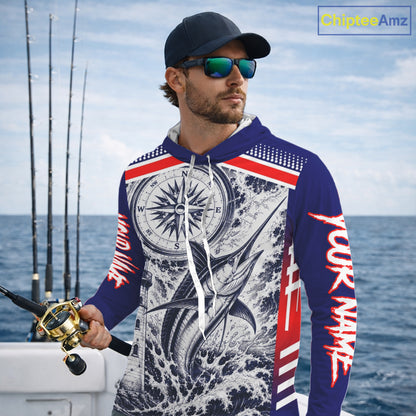 Angler wearing personalized Marlin blue long sleeve hooded performance fishing shirt on the boat 
