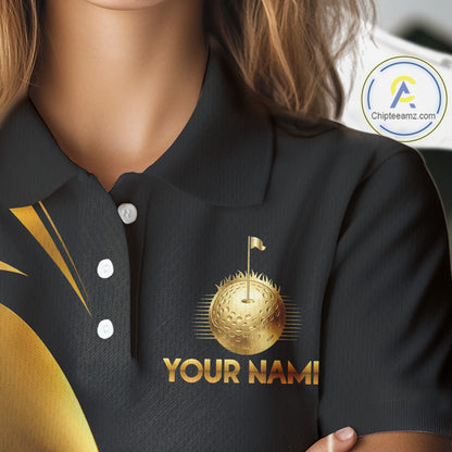 Close-up of golf clubs graphic on Black and Gold womens golf polo